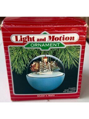 VTG 1988 Hallmark Skater's Waltz Magic Light & Motion Clear Ornament-NOT TESTED